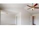 Large bedroom with ceiling fan, neutral carpet and white walls at 2320 Polaris Sw Way, Atlanta, GA 30331