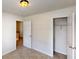Bedroom with doors leading to hallway and closet at 2320 Polaris Sw Way, Atlanta, GA 30331