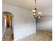 Dining area showcasing elegant wainscoting and chandelier at 2320 Polaris Sw Way, Atlanta, GA 30331