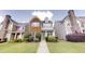 Charming townhome with brick and siding exterior, well-maintained landscaping, and inviting entrance at 2320 Polaris Sw Way, Atlanta, GA 30331