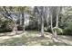 Trees and greenery in backyard, with plenty of natural light at 3136 Palomino Dr, Powder Springs, GA 30127