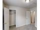 Neutrally decorated bedroom with closet and recessed lighting; bright and spacious at 3136 Palomino Dr, Powder Springs, GA 30127