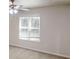 Bedroom featuring neutral walls, carpet and window with blinds, creating a calming and bright atmosphere at 3136 Palomino Dr, Powder Springs, GA 30127