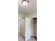 Bedroom featuring neutral walls, carpet and built in closet and overhead light fixture at 3136 Palomino Dr, Powder Springs, GA 30127