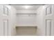 Well-organized walk-in closet with built-in shelving and ample storage space at 3136 Palomino Dr, Powder Springs, GA 30127