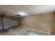 Spacious garage with a garage door and overhead lighting at 3136 Palomino Dr, Powder Springs, GA 30127