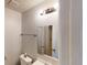 Well-lit bathroom with sink, toilet, mirror, and vanity lighting at 3457 Newberry Trl, Decatur, GA 30034