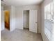 Bedroom with plush carpeting and closet with open doors at 3457 Newberry Trl, Decatur, GA 30034
