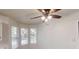 Bright kitchen nook with windows, a fan, and white walls at 3457 Newberry Trl, Decatur, GA 30034