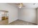 Bright dining area featuring modern floors and a ceiling fan, adjacent to the kitchen at 3457 Newberry Trl, Decatur, GA 30034