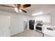 Bright kitchen with stainless appliances, white cabinets, and an adjacent breakfast nook at 3457 Newberry Trl, Decatur, GA 30034