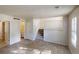Open-concept living area with tile floors, stairs, and view to an adjacent bathroom at 3457 Newberry Trl, Decatur, GA 30034