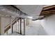 Unfinished basement with exposed ceiling and visible insulation is ready to be finished at 3695 Fox Hills Se Dr, Marietta, GA 30067