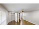 Bright bedroom with hardwood floors, natural light and closet doors that are ajar at 3695 Fox Hills Se Dr, Marietta, GA 30067