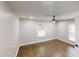 Bright bedroom featuring hardwood floors, natural light, and neutral walls at 3695 Fox Hills Se Dr, Marietta, GA 30067