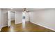 Primary bedroom with hardwood floors has attached bath and walk-in closet at 3695 Fox Hills Se Dr, Marietta, GA 30067