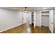 Open bedroom with hardwood flooring, ceiling fan, and closets visible at 3695 Fox Hills Se Dr, Marietta, GA 30067