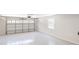 Clean, open garage space with an insulated door, side window, and light gray walls at 3695 Fox Hills Se Dr, Marietta, GA 30067