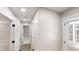 Hallway with wood look flooring and neutral paint at 3695 Fox Hills Se Dr, Marietta, GA 30067