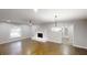 Spacious living room with a fireplace and large windows for natural light at 3695 Fox Hills Se Dr, Marietta, GA 30067