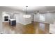 Open-concept living room showcases a kitchen with modern appliances and island at 3695 Fox Hills Se Dr, Marietta, GA 30067