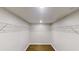 Large walk-in closet with hardwood floors and ample shelving at 3695 Fox Hills Se Dr, Marietta, GA 30067