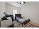 Bedroom with simple decor, featuring a full bed, desk, and modern black and white rug at 90 Mckown Rd, Fayetteville, GA 30214