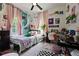 Eclectic bedroom design featuring bright decor, a full bed, and a workspace at 90 Mckown Rd, Fayetteville, GA 30214