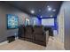 Home theater features comfortable reclining seating and a large projection screen at 90 Mckown Rd, Fayetteville, GA 30214