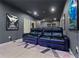 Home theater features comfortable reclining seating and a large projection screen at 90 Mckown Rd, Fayetteville, GA 30214