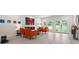 Bright living room with modern decor, a cozy fireplace and access to the backyard at 90 Mckown Rd, Fayetteville, GA 30214