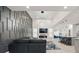 Expansive living room with vaulted ceilings, modern lighting and an open-concept design at 90 Mckown Rd, Fayetteville, GA 30214