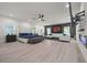 Spacious main bedroom with sitting area, electric fireplace, and luxurious modern finishes at 90 Mckown Rd, Fayetteville, GA 30214