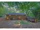 Brick house with deck in wooded backyard at 2286 Capehart Ne Cir, Atlanta, GA 30345