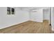 Basement with recessed lighting, wood-style flooring, and large window at 2286 Capehart Ne Cir, Atlanta, GA 30345