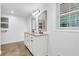 Bright bathroom featuring double vanities and large mirrors, providing a clean, modern aesthetic at 2286 Capehart Ne Cir, Atlanta, GA 30345