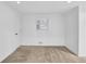 A bright, carpeted bedroom with a window allows for natural light and comfortable living at 2286 Capehart Ne Cir, Atlanta, GA 30345
