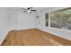 Well-lit living room boasting hardwood floors, fresh white walls, and a large window for natural light at 2286 Capehart Ne Cir, Atlanta, GA 30345