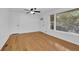 Inviting room with hardwood floors, bright white trim, and natural light from multiple windows at 2286 Capehart Ne Cir, Atlanta, GA 30345