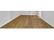 Spacious room featuring beautiful light brown hardwood flooring and white trim at 2286 Capehart Ne Cir, Atlanta, GA 30345