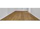 An empty room with beautiful hardwood flooring at 2286 Capehart Ne Cir, Atlanta, GA 30345