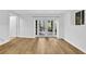Bright room featuring light hardwood floors and glass doors at 2286 Capehart Ne Cir, Atlanta, GA 30345