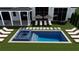 Stunning backyard with a sparkling pool, hot tub, and multiple lounge areas for outdoor entertaining at 245 Heatherton Way, Milton, GA 30009