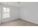A cozy carpeted bedroom with lots of natural light at 4457 Watson Ridge Dr, Stone Mountain, GA 30083