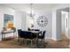 Dining room with hardwood floors, a rustic chandelier, and a table with seating for six at 4457 Watson Ridge Dr, Stone Mountain, GA 30083