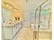 Bathroom features a soaking tub, separate glass shower, and dual-sink vanity at 5599 Wheeler Ridge Rd, Auburn, GA 30011