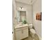 Charming bathroom with modern vanity and elegant fixtures, designed for both style and functionality at 5599 Wheeler Ridge Rd, Auburn, GA 30011