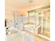 Bathroom featuring a soaking tub, separate shower, and vanity with sink at 5599 Wheeler Ridge Rd, Auburn, GA 30011