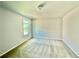 Bright bedroom with carpet flooring and neutral paint at 5599 Wheeler Ridge Rd, Auburn, GA 30011