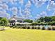 Well-maintained community pool, landscaping, and green space at 5599 Wheeler Ridge Rd, Auburn, GA 30011